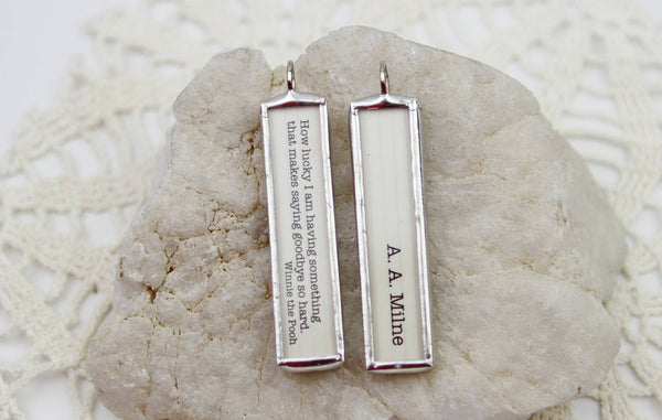 Jennifer Dahl Designs LLC - Winnie the Pooh How Lucky Book Quote Charm Necklace